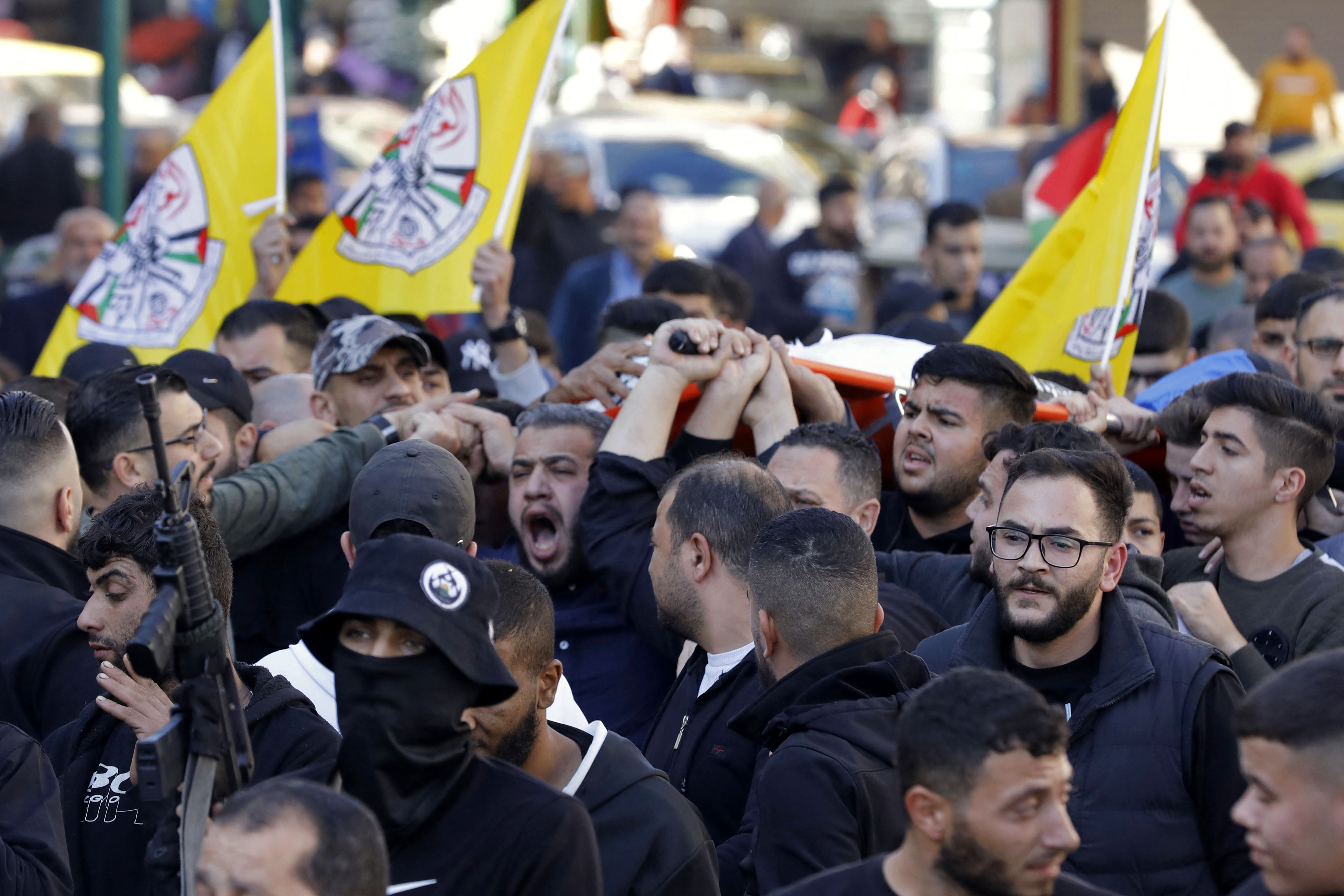 جماهير نابلس تشيع جثمان الشهيد الطفل أحمد شحادة .. تصوير: "الفرنسية"