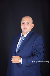 الأستاذ أمين نمروطي