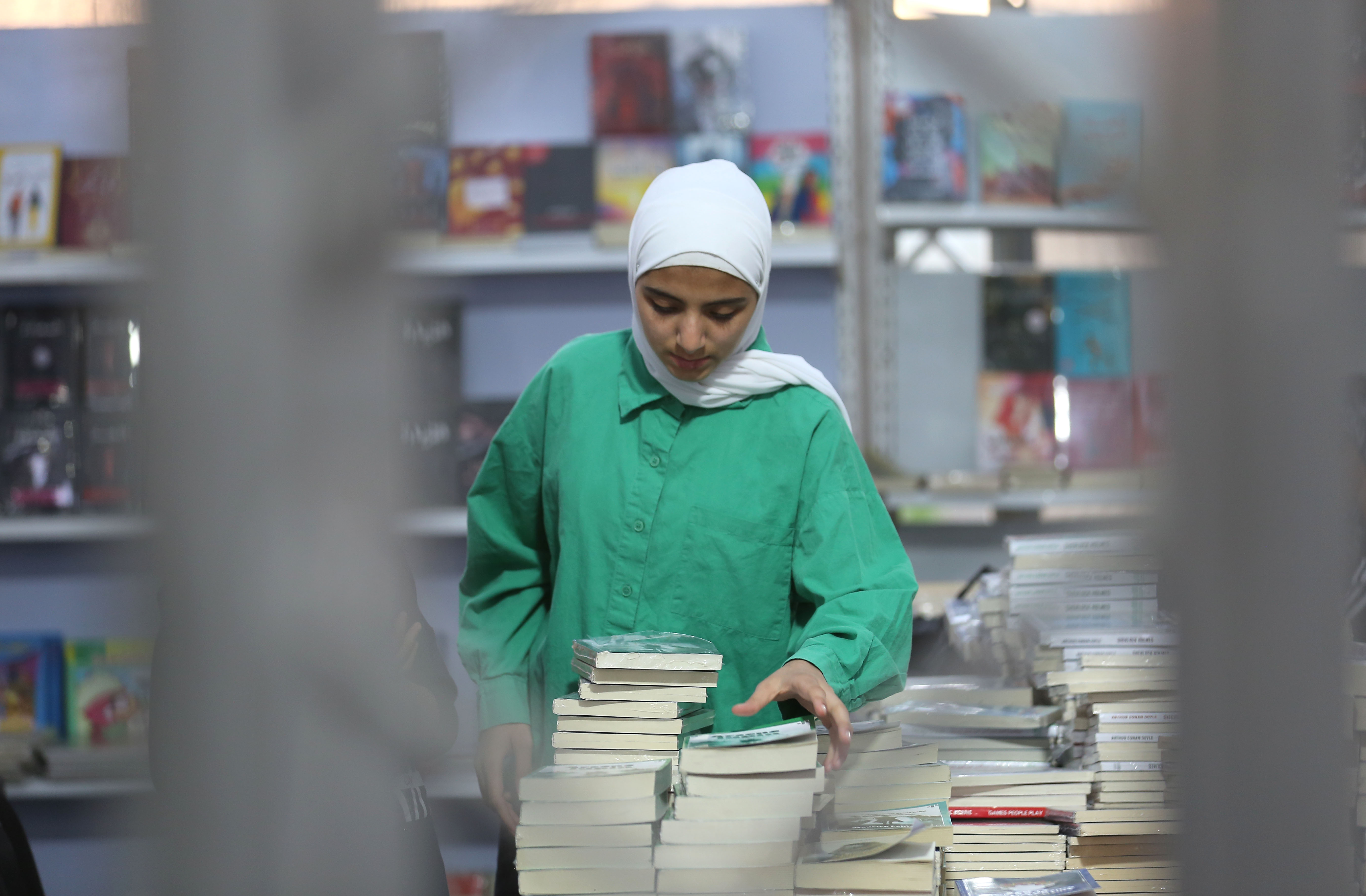 من معرض فلسطين الدولي للكتاب في رام الله .. تصوير: "شينخوا"