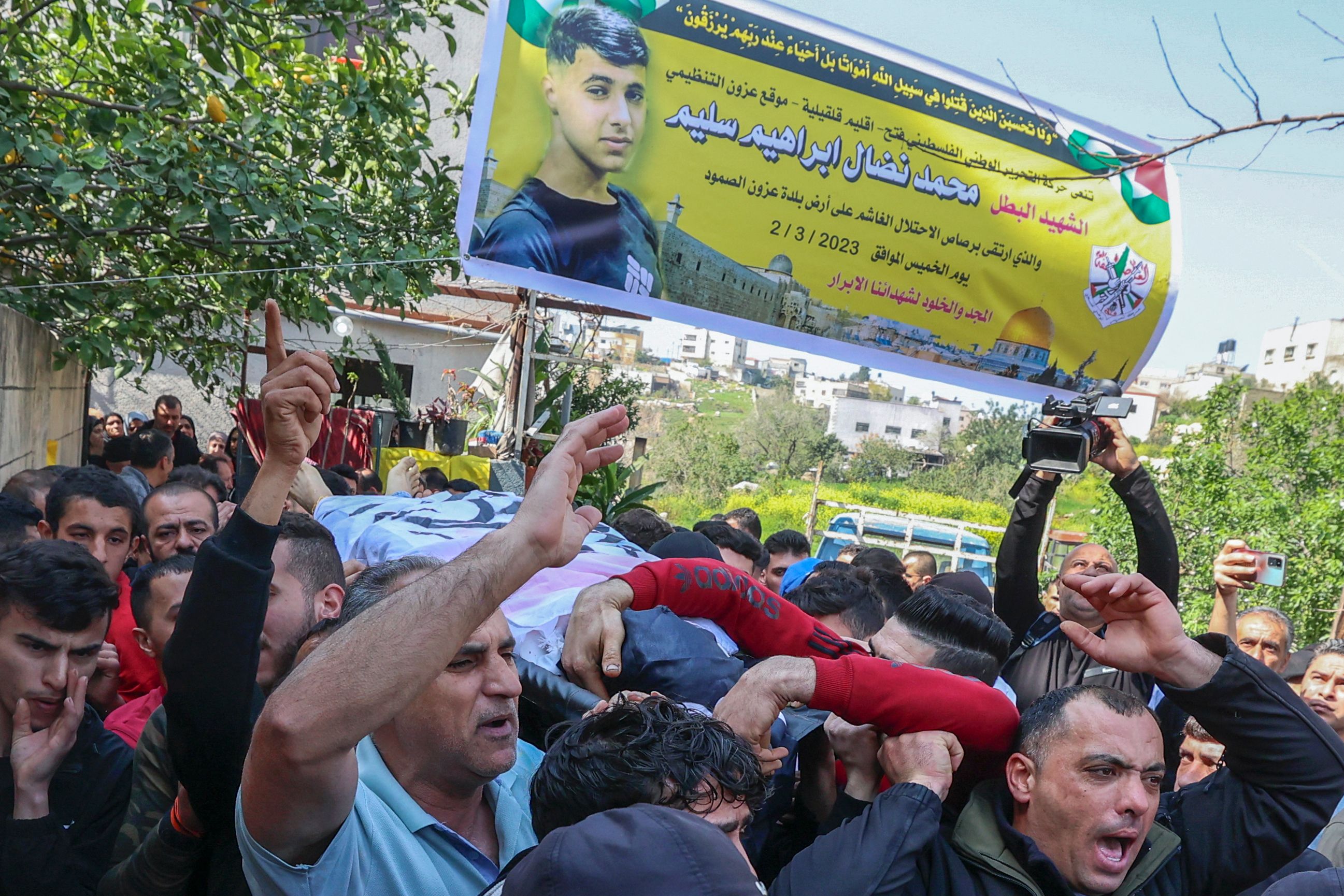 من تشييع الشهيد الطفل محمد سليم في قلقيلية . تصوير: "الفرنسية"