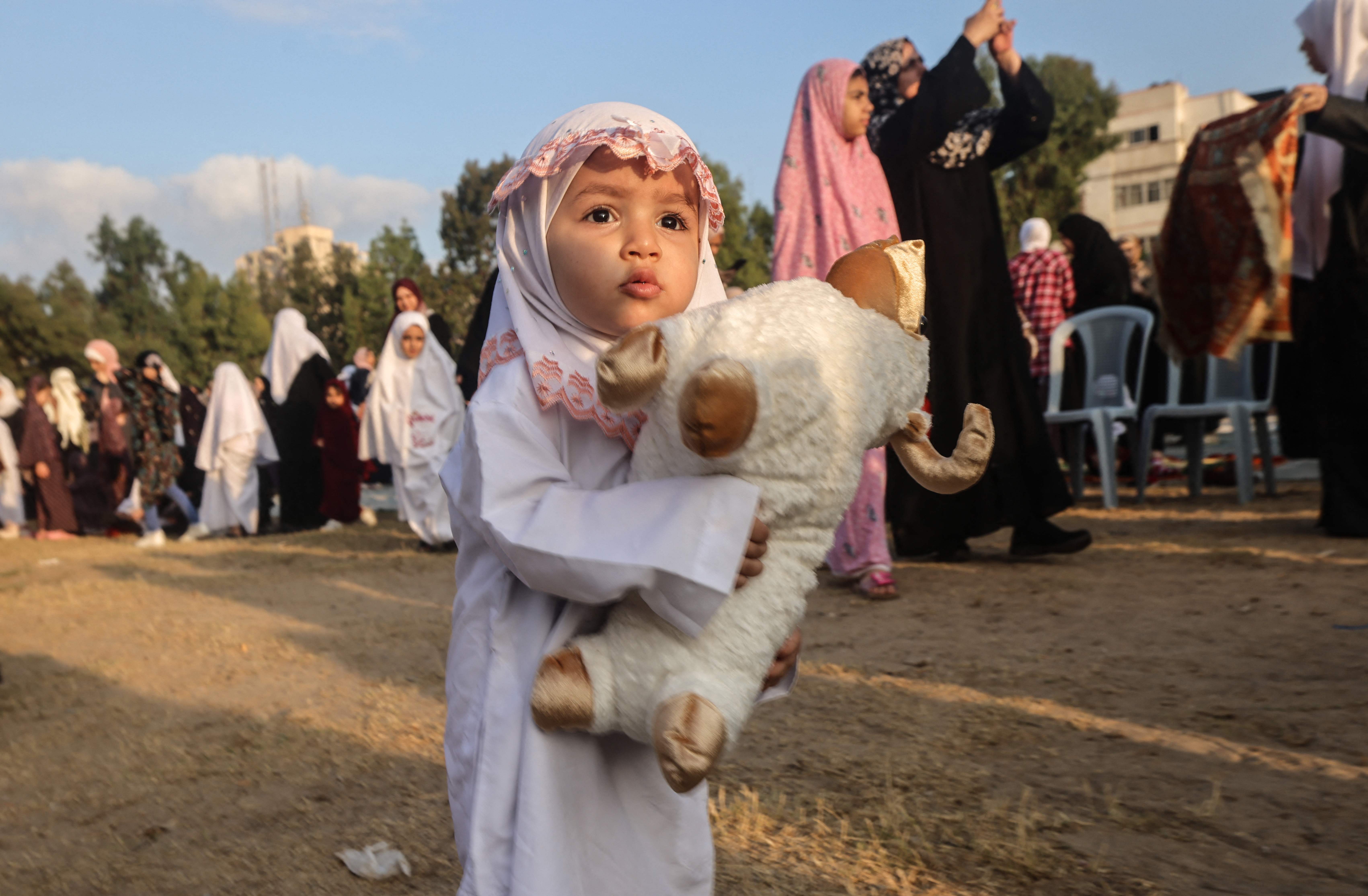 من فرحة الفلسطينيين بعيد الأضحى .. تصوير: "الفرنسية"