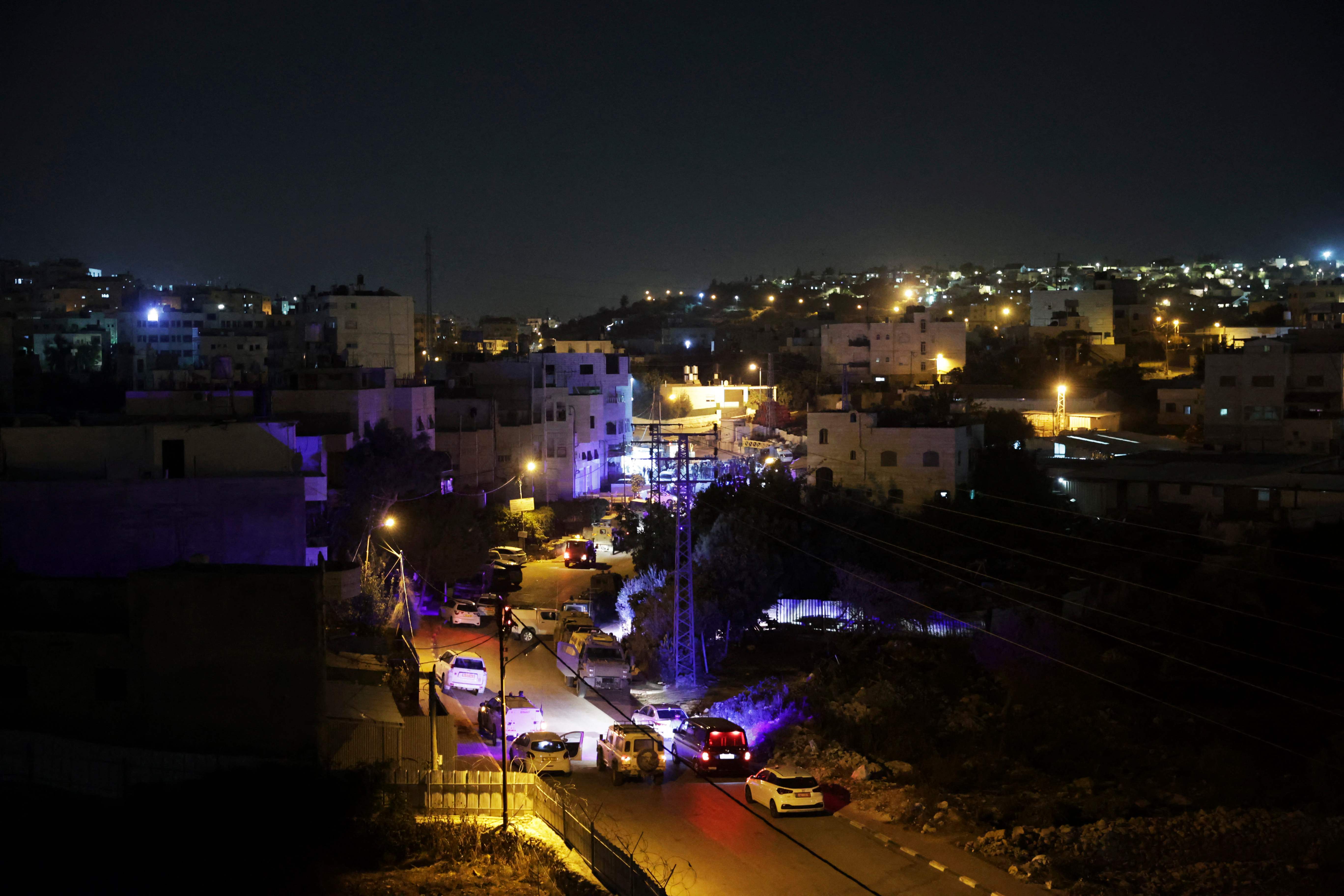 من مكان ومحيط العملية التي وقعت بالخليل .. تصوير: "الفرنسية"