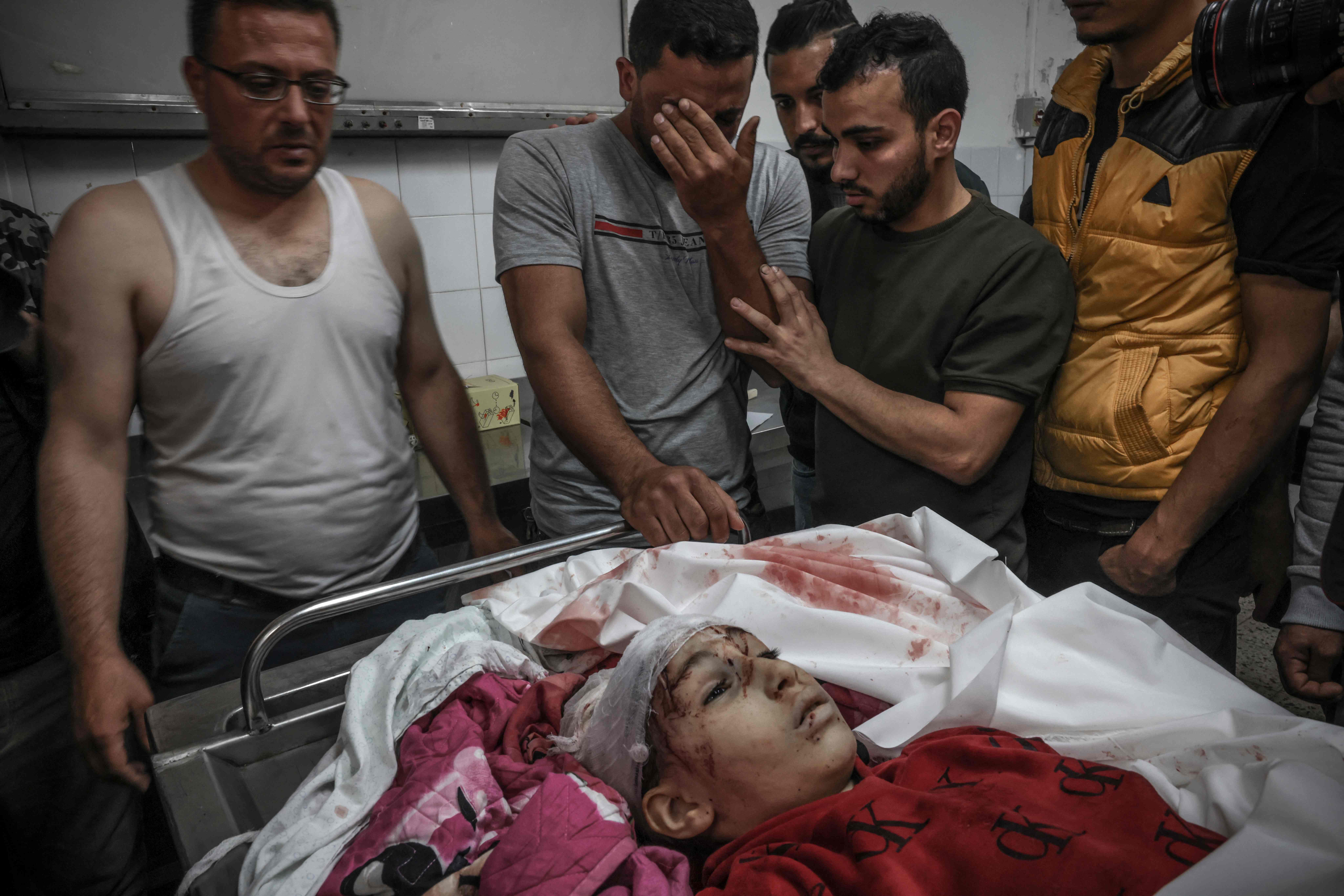 من شهداء قطاع غزة بفعل العدوان الإسرائيلي .. تصوير: "الفرنسية"