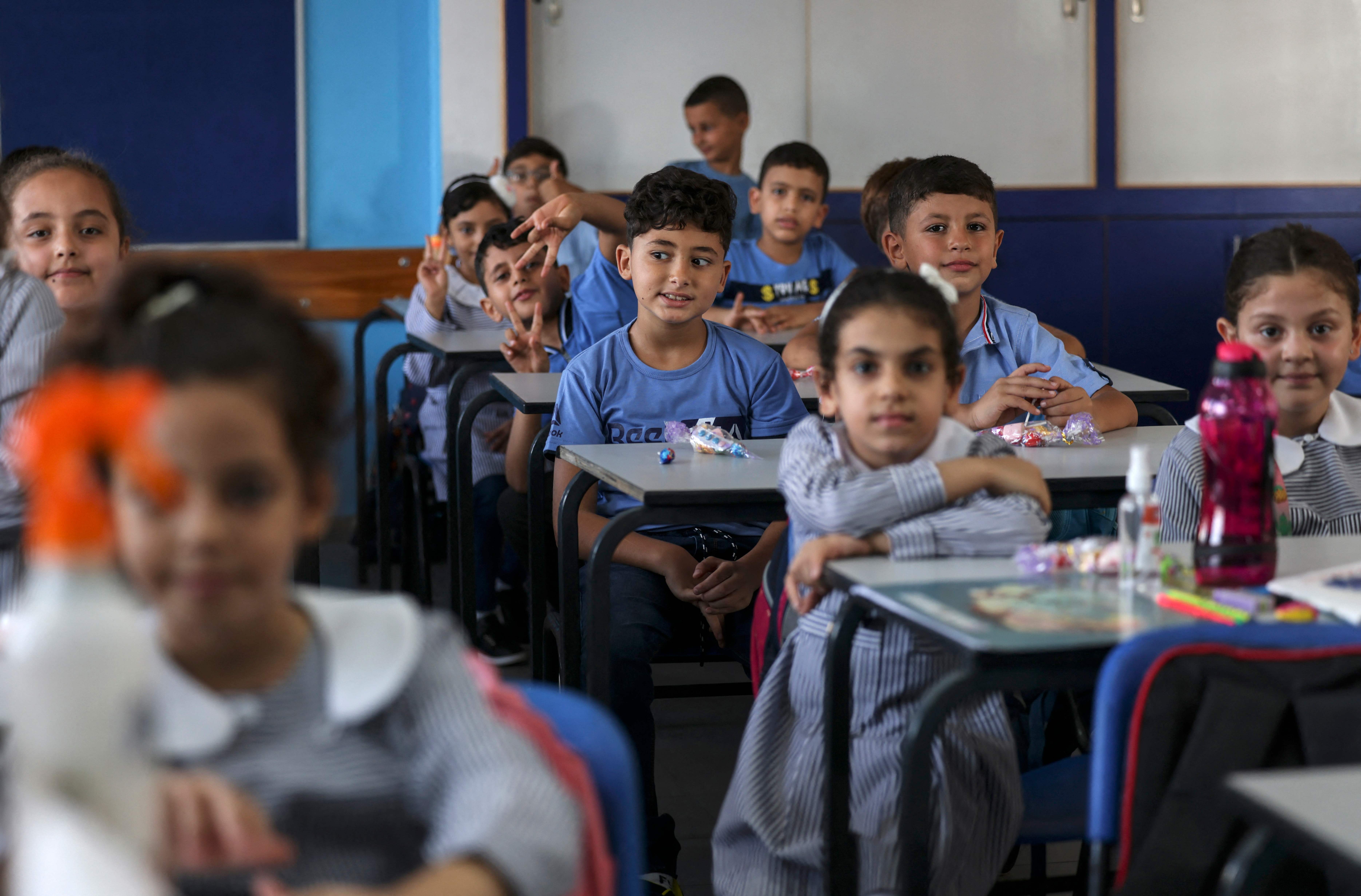 موسم دراسي جديد في فلسطين .. تصوير: "الفرنسية"