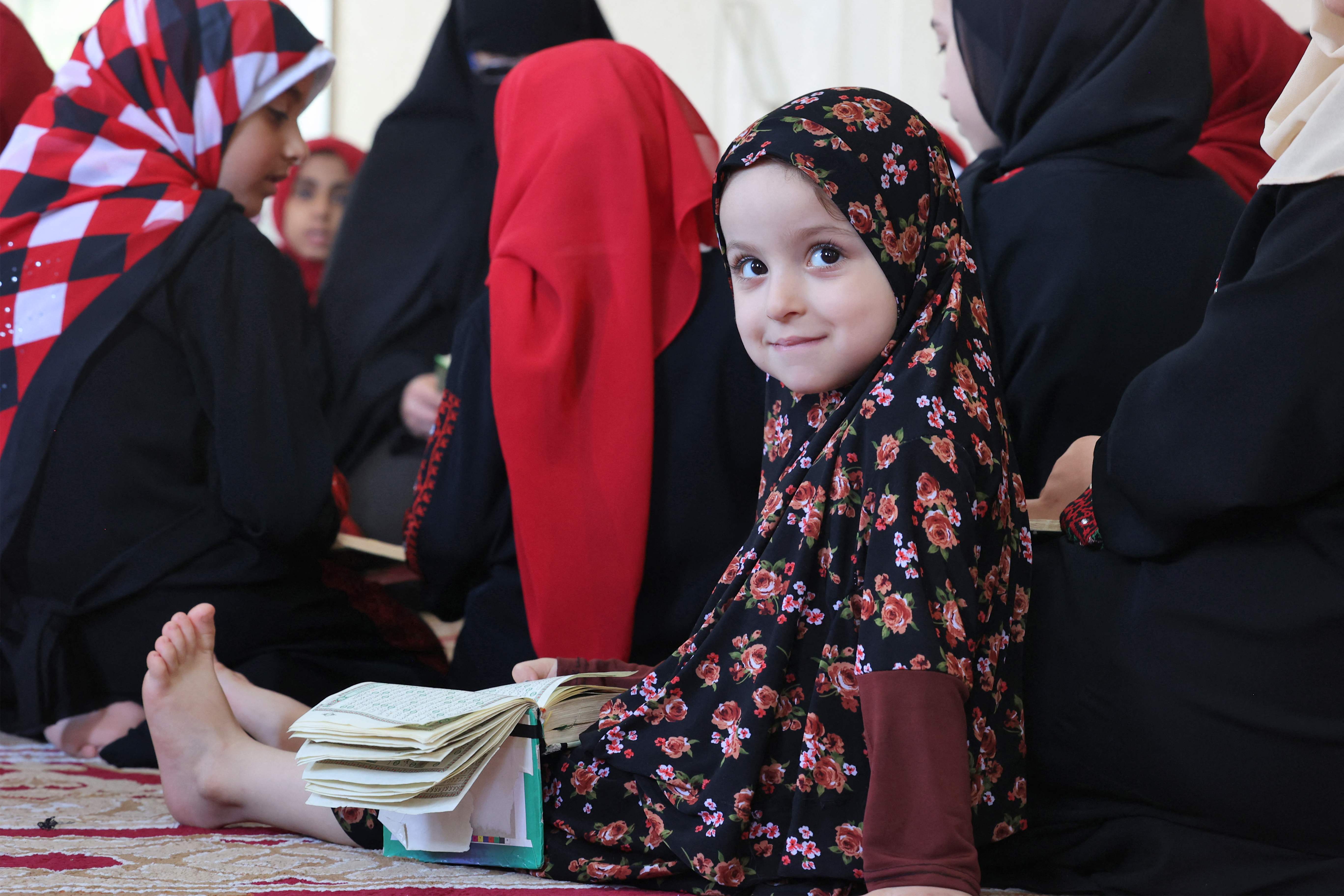 نشاط حلقات تحفيظ القرآن بغزة خلال الإجازة المدرسية.. تصوير: "الفرنسية"