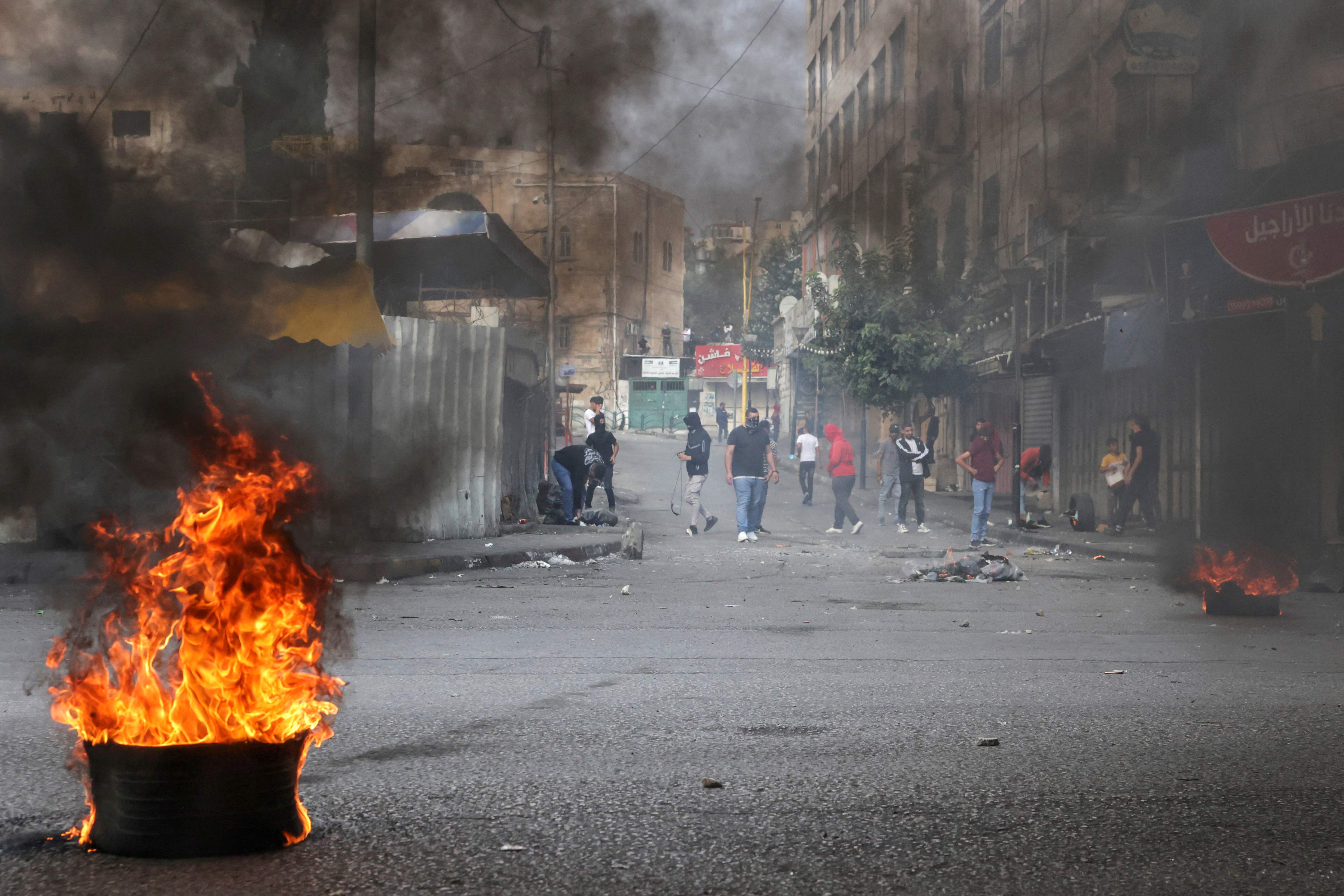 من المواجهات مع الاحتلال في الخليل .. تصوير: "الفرنسية"