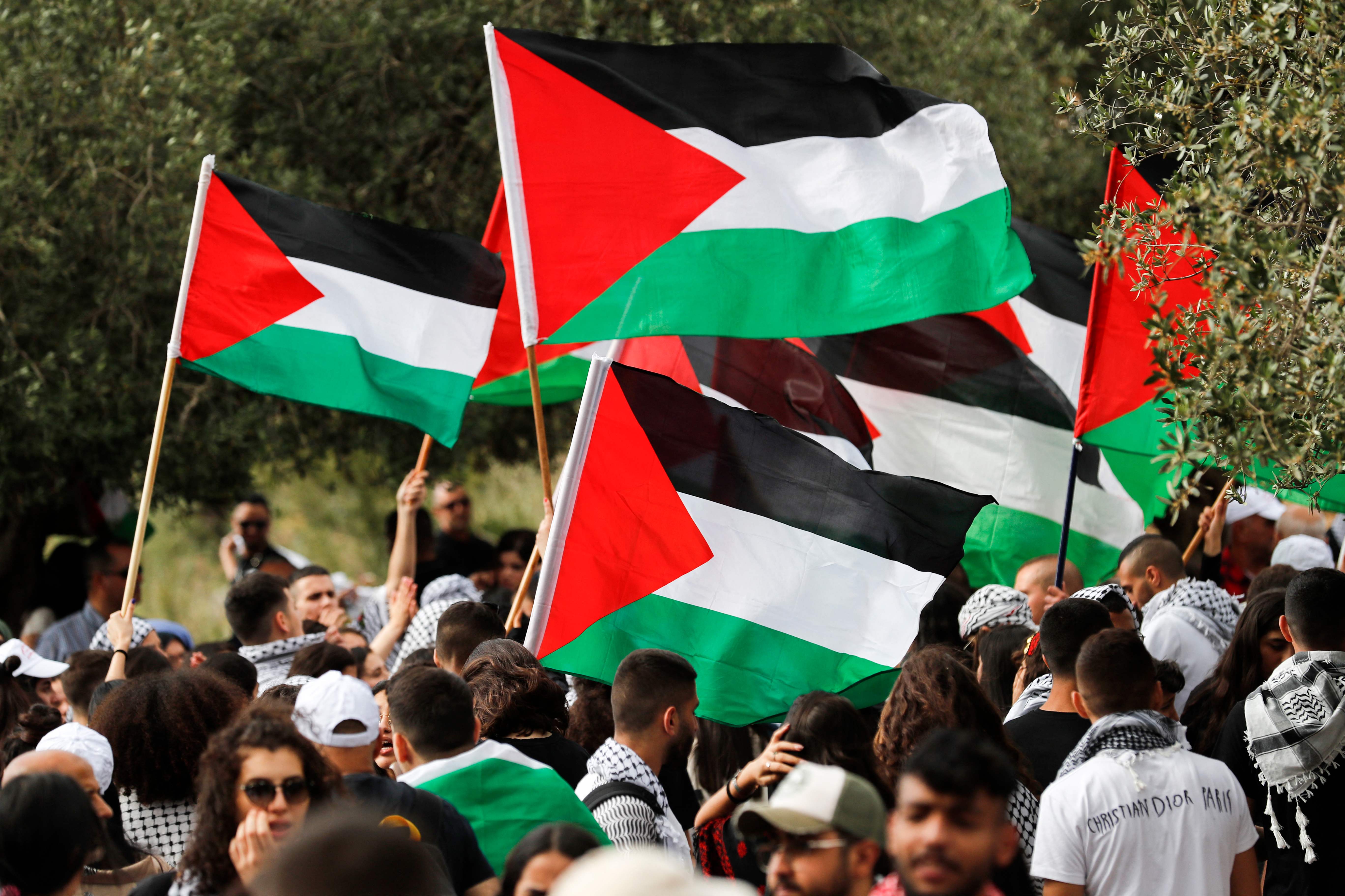 فلسطينيو الداخل ينظمون مسيرة العودة الـ 25 في قرية ميعار المهجرة .. تصوير: "الفرنسية"