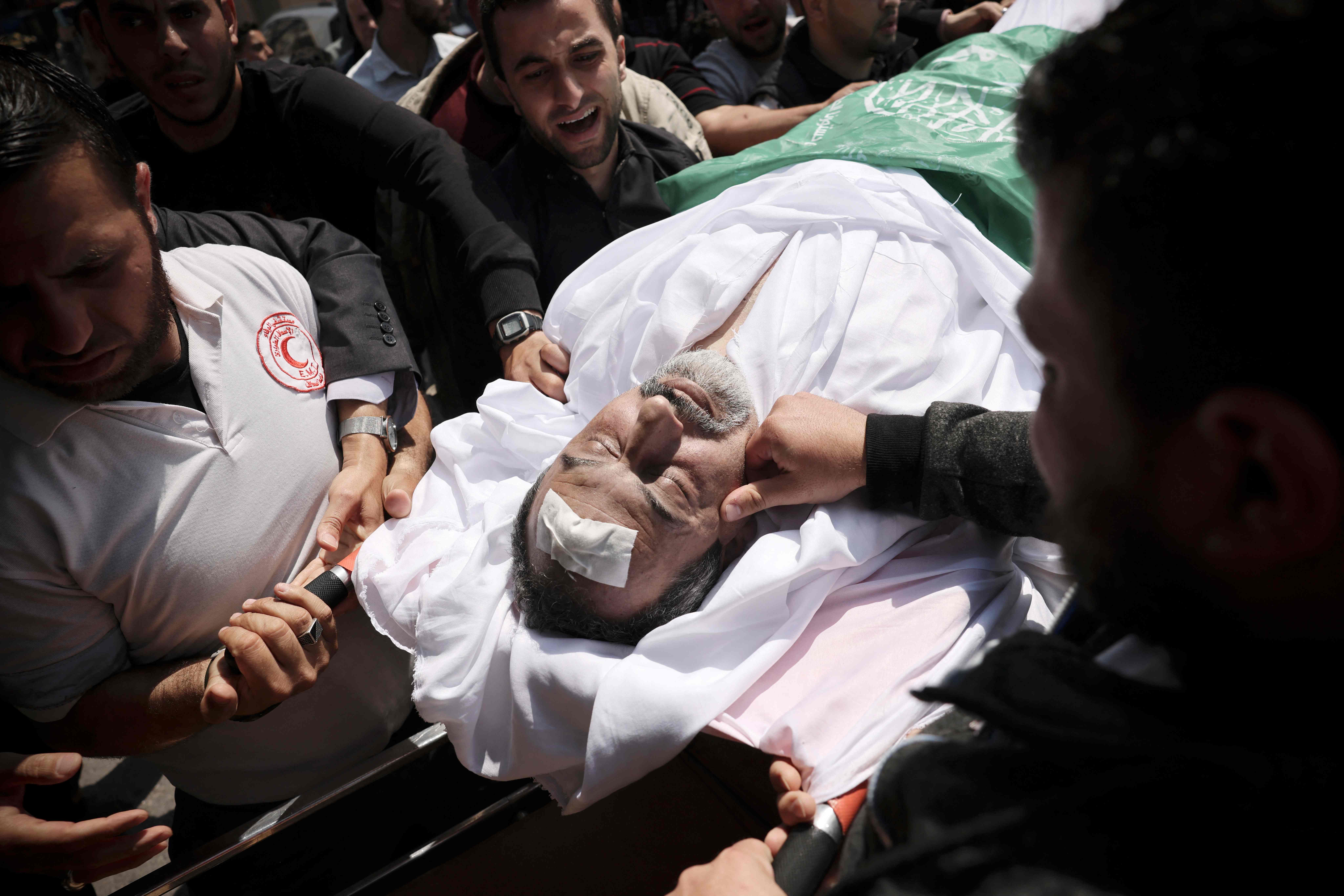 من تشييع شهداء العدوان على غزة .. تصوير: "الفرنسية"
