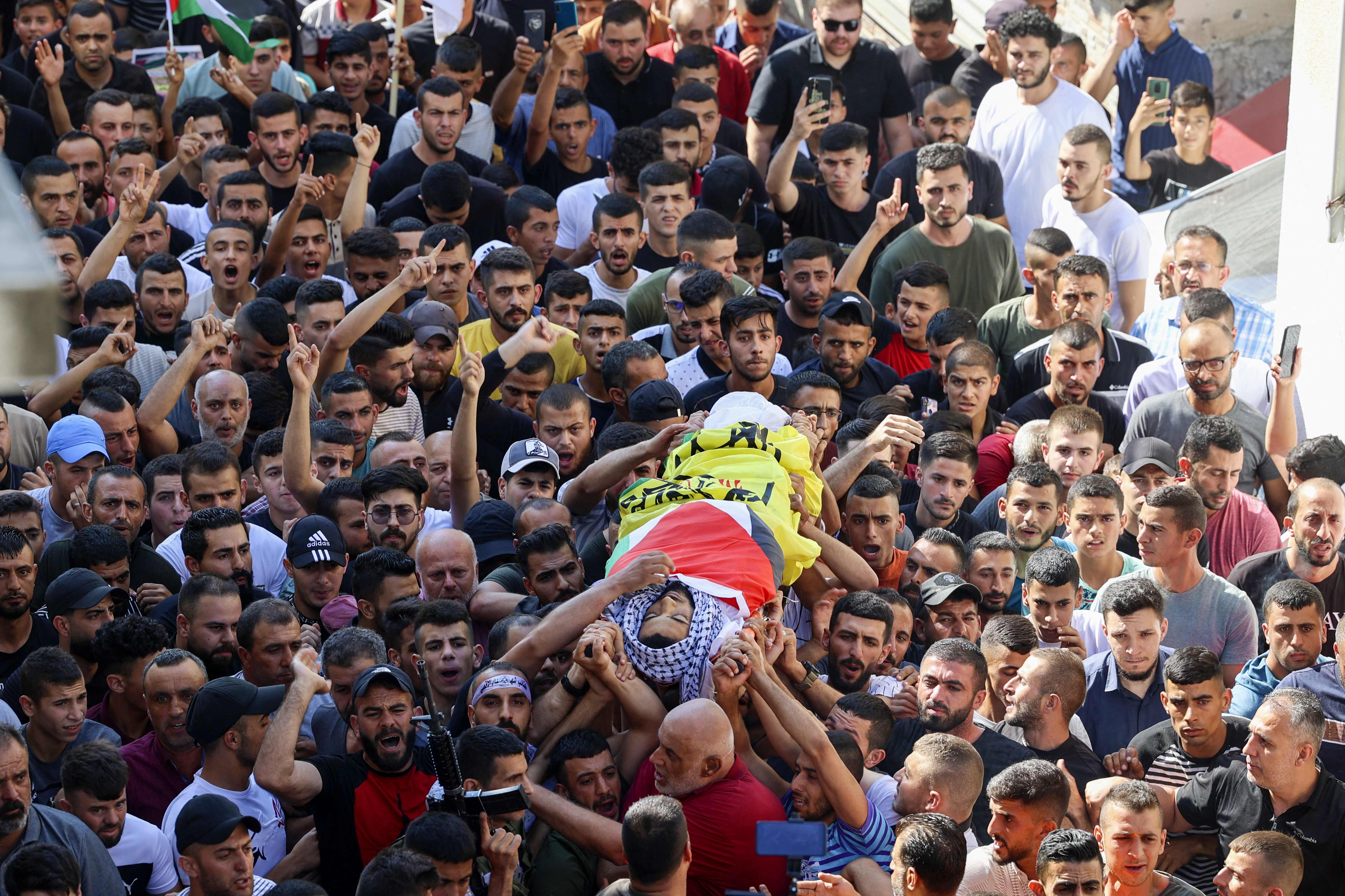 من تشييع الشهيد كامل علاونة في جبع جنوب جنين .. تصوير: "الفرنسية"